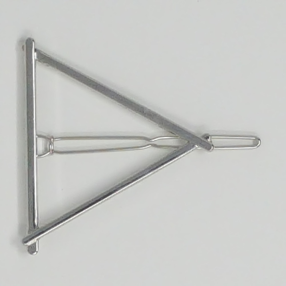 1 gold and 1 silver metal triangle shaped hair pin
